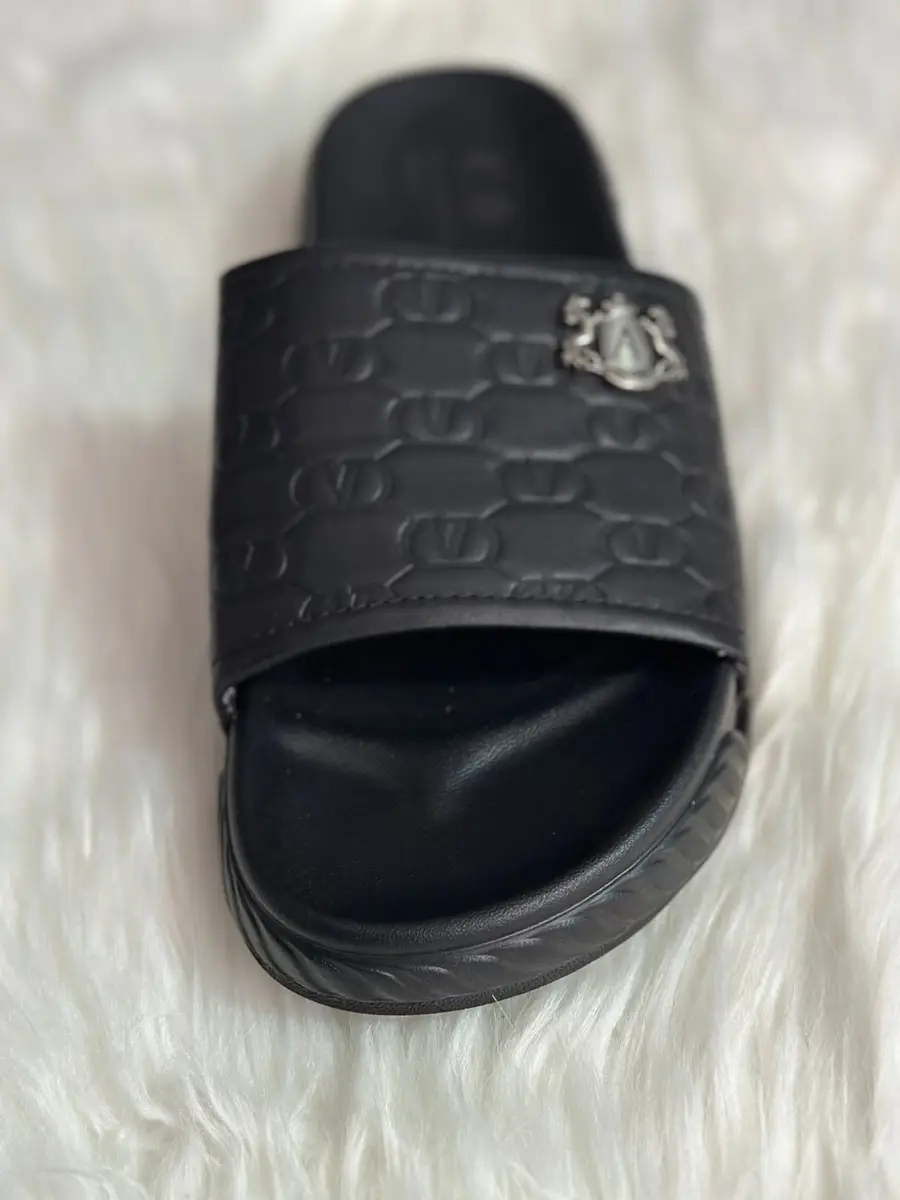 Men's Black Monogram Embossed Leather Slides with Crest Accent